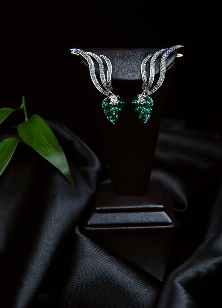 Diamond earrings with emerald accent, Nagpur