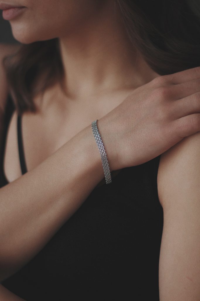 Woman wearing silver bracelet, Nagpur